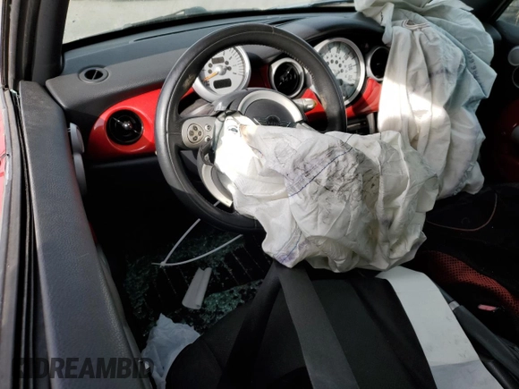 2005 MINI Convertible with VIN WMWRF33525TG12494, listed as a Copart auction lot 43010175 with Not provided miles and Salvage title. Bid and sale history available at DreamBid. Image 8.