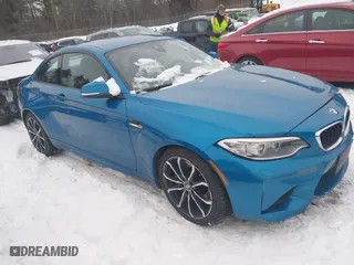 2017 BMW M2 with VIN WBS1H9C38HV887362, listed as a IAAI auction lot 41524962 with 58,866 mi miles. Bid and sale history available at carsss.com. Image 1.