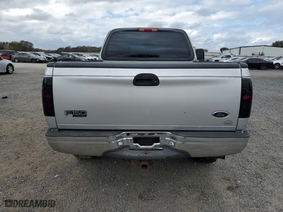 2004 Ford F-150 Heritage XL with VIN 2FTRF18284CA42951, listed as a Copart auction lot 79665784 with 160,293 mi miles and Salvage Title. Bid and sale history available at carsss.com. Image 6.