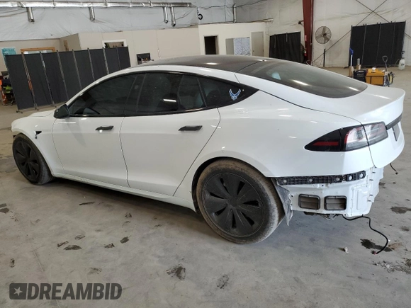 2024 Tesla Model S with VIN 5YJSA1E56RF538488, listed as a Copart auction lot 54702885 with 9,470 mi miles and Salvage title. Bid and sale history available at DreamBid. Image 2.