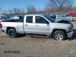 2014 Chevrolet Silverado 1500 LT with VIN 1GCVKREC0EZ151088, listed as a IAAI auction lot 41763808 with 124,668 mi miles and . Bid and sale history available at DreamBid. Image 13.