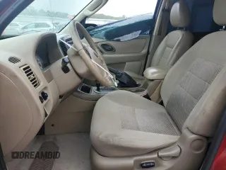 2005 Ford Escape XLT with VIN 1FMYU03175KA63888, listed as a Copart auction lot 71617174 with 145,107 mi miles and Salvage Title. Bid and sale history available at carsss.com. Image 7.