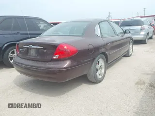 2000 Ford Taurus SEL z VIN 1FAFP56S2YA183814, wystawiony jako IAAI lot #42269148 z przebiegiem 210 990 mil mil oraz . Historia ofert i sprzedaży dostępna na DreamBid. Obrazek 4.
