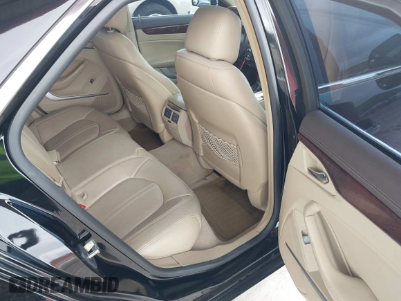 2009 Cadillac CTS RWD w/1SB with VIN 1G6DU57V290147277, listed as a IAAI auction lot 41995209 with 120,576 mi miles. Bid and sale history available at carsss.com. Image 8.