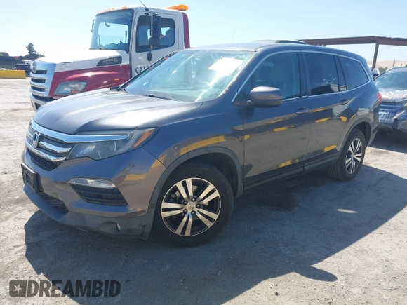 2017 Honda Pilot EX-L with VIN 5FNYF6H59HB032480, listed as a IAAI auction lot 42488789 with 112,595 mi miles and . Bid and sale history available at DreamBid. Image 17.
