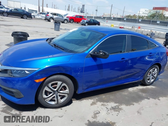 2017 Honda Civic LX z VIN 2HGFC2F56HH516730, wystawiony jako IAAI lot #42130963 z przebiegiem 119 236 mil mil oraz . Historia ofert i sprzedaży dostępna na DreamBid. Obrazek 14.
