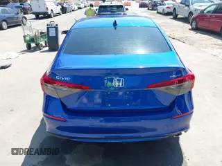 2023 Honda Civic Sedan Sport with VIN 2HGFE2F55PH524584, listed as a IAAI auction lot 41969609 with 66,313 mi miles. Bid and sale history available at carsss.com. Image 16.