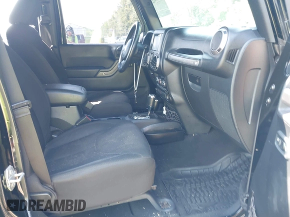 2015 Jeep Wrangler Unlimited Sport with VIN 1C4BJWDG2FL518487, listed as a IAAI auction lot 42593022 with 161,991 mi miles and . Bid and sale history available at DreamBid. Image 5.