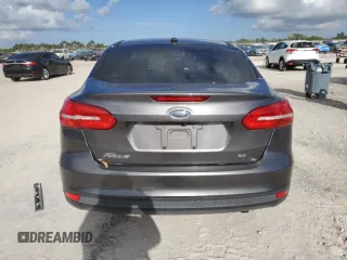 2018 Ford Focus SE with VIN 1FADP3F21JL298832, listed as a Copart auction lot 61262655 with 122,331 mi miles and Clean title. Bid and sale history available at DreamBid. Image 6.