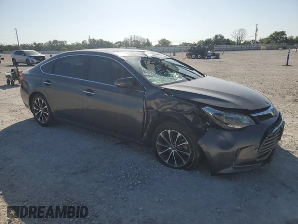 2018 Toyota Avalon XLE with VIN 4T1BK1EB9JU276380, listed as a Copart auction lot 52204965 with 110,860 mi miles and Salvage Title. Bid and sale history available at DreamBid. Image 4.