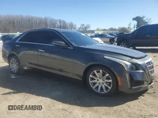 2014 Cadillac CTS AWD with VIN 1G6AW5SX3E0127216, listed as a Copart auction lot 50240125 with 93,353 mi miles and Salvage title. Bid and sale history available at DreamBid. Image 4.