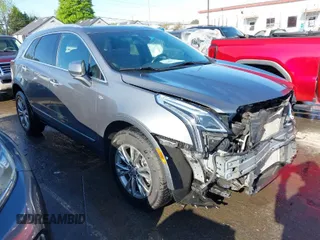 2022 Cadillac XT5 AWD Premium Luxury with VIN 1GYKNDRS3NZ106378, listed as a IAAI auction lot 41963965 with 56,042 mi miles and . Bid and sale history available at DreamBid. Image 1.