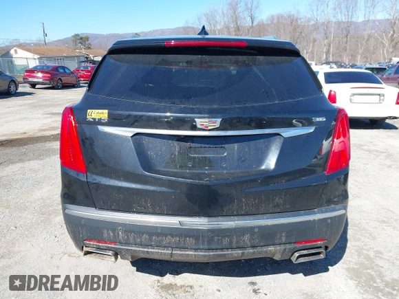 2018 Cadillac XT5 FWD with VIN 1GYKNARS5JZ235585, listed as a IAAI auction lot 41607440 with 77,220 mi miles and . Bid and sale history available at DreamBid. Image 16.