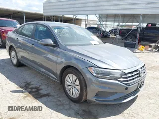 2019 Volkswagen Jetta S z VIN 3VWC57BU8KM144934, wystawiony jako IAAI lot #42224274 z przebiegiem 136 839 mil mil oraz . Historia ofert i sprzedaży dostępna na DreamBid. Obrazek 1.