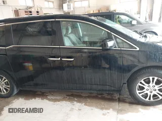 2012 Honda Odyssey EX z VIN 5FNRL5H4XCB017557, wystawiony jako IAAI lot #42367322 z przebiegiem 209 630 mil mil oraz . Historia ofert i sprzedaży dostępna na DreamBid. Obrazek 13.