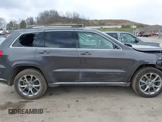 2020 Jeep Grand Cherokee Summit with VIN 1C4RJFJT2LC408499, listed as a IAAI auction lot 41854021 with 78,189 mi miles and . Bid and sale history available at DreamBid. Image 14.
