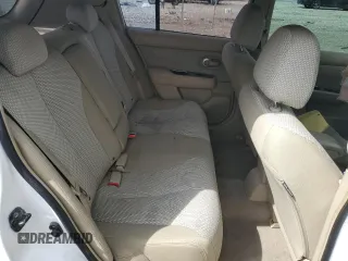2009 Nissan Versa SL z VIN 3N1BC13E09L388802, wystawiony jako Copart lot #53904985 z przebiegiem 134 342 mil mil oraz Szkoda całkowita • Salvage title. Historia ofert i sprzedaży dostępna na DreamBid. Obrazek 11.