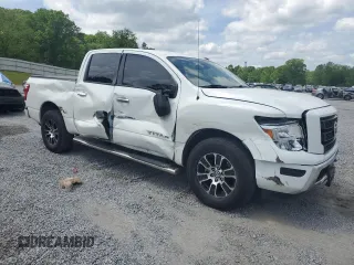 2021 Nissan Titan SV with VIN 1N6AA1ECXMN528984, listed as a Copart auction lot 53950365 with 64,474 mi miles and Salvage title. Bid and sale history available at DreamBid. Image 4.
