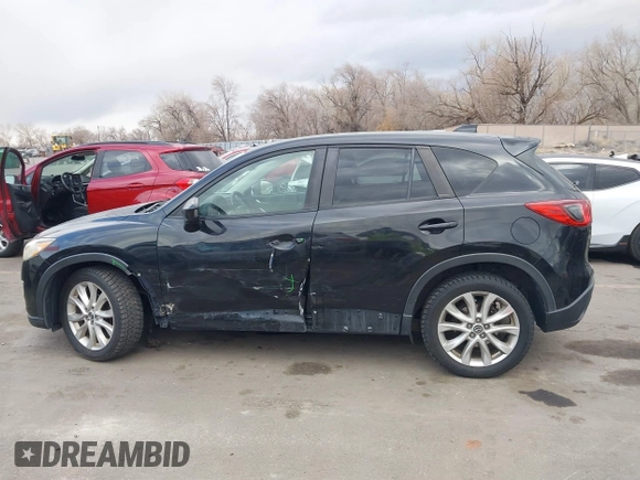 2013 Mazda CX-5 Grand Touring with VIN JM3KE4DEXD0154638, listed as a IAAI auction lot 41528944 with 195,159 mi miles. Bid and sale history available at carsss.com. Image 14.