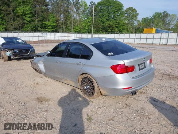 2013 BMW 3 Series 328i with VIN WBA3C1C54DK103415, listed as a IAAI auction lot 42147590 with 113,188 mi miles and . Bid and sale history available at carsss.com. Image 3.