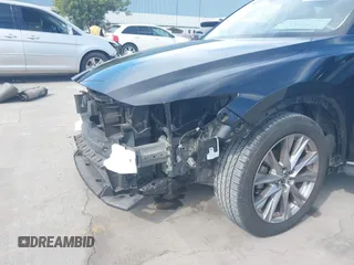 2021 Mazda CX-5 Grand Touring with VIN JM3KFBDM4M1426197, listed as a IAAI auction lot 42004644 with 43,814 mi miles. Bid and sale history available at carsss.com. Image 20.