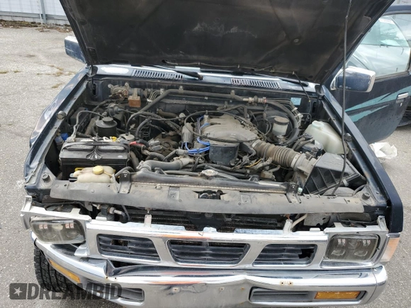1994 Nissan Frontier SE с VIN 1N6HD16Y8RC356019, выставлен на аукционе Copart как лот 70048824 с пробегом 225 359 миль миль и Списание • Salvage title. История ставок и продаж доступна на DreamBid. Изображение 11.