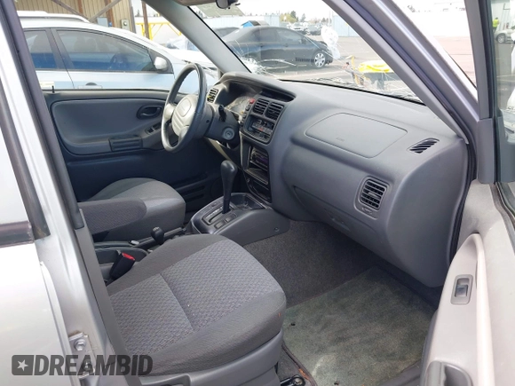2003 Chevrolet Tracker with VIN 2CNBJ13C336946019, listed as a IAAI auction lot 41814810 with 112,317 mi miles and . Bid and sale history available at DreamBid. Image 5.