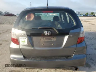 2013 Honda Fit с VIN JHMGE8H33DC067627, выставлен на аукционе Copart как лот 51168015 с пробегом 170 522 миль миль и Списание • Salvage title. История ставок и продаж доступна на DreamBid. Изображение 6.
