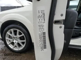 2013 Dodge Journey Crew with VIN 3C4PDCDG9DT537552, listed as a Copart auction lot 58126615 with 96,884 mi miles and Salvage title. Bid and sale history available at DreamBid. Image 13.