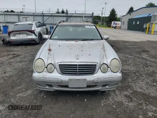 2000 Mercedes-Benz E-Class AWD with VIN WDBJH82J6YX039226, listed as a Copart auction lot 72559034 with 213,680 mi miles and Clean Title. Bid and sale history available at carsss.com. Image 5.