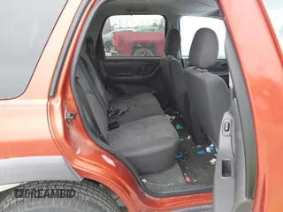 2006 Mazda Tribute i with VIN 4F2YZ02Z96KM08546, listed as a IAAI auction lot 41554299 with Not Provided miles and . Bid and sale history available at carsss.com. Image 8.
