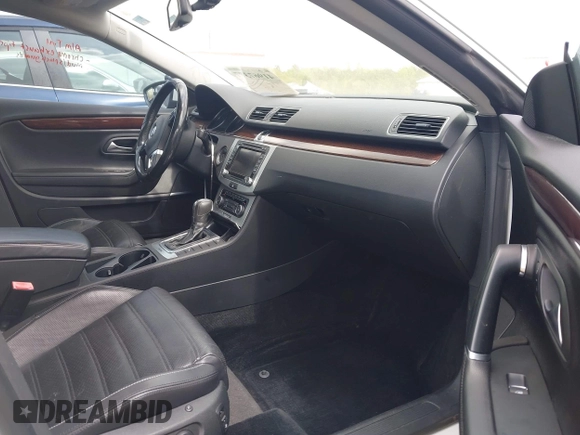 2012 Volkswagen CC VR6 Executive 4Motion with VIN WVWGU7AN8CE527488, listed as a IAAI auction lot 41967377 with 109,609 mi miles. Bid and sale history available at carsss.com. Image 5.