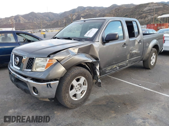2007 Nissan Frontier SE z VIN 1N6AD09U67C411083, wystawiony jako IAAI lot #41691251 z przebiegiem 186 495 mil mil oraz . Historia ofert i sprzedaży dostępna na DreamBid. Obrazek 2.
