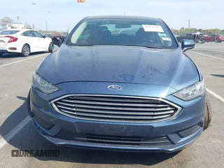 2018 Ford Fusion SE z VIN 3FA6P0H74JR176113, wystawiony jako IAAI lot #42074916 z przebiegiem 78 940 mil mil oraz . Historia ofert i sprzedaży dostępna na DreamBid. Obrazek 12.