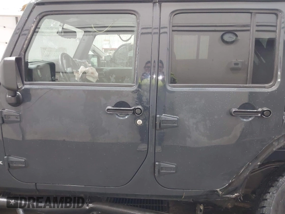 2018 Jeep Wrangler JK Unlimited Sport with VIN 1C4BJWDG9JL890272, listed as a IAAI auction lot 41551844 with 77,655 mi miles. Bid and sale history available at carsss.com. Image 15.