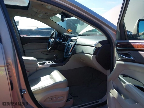 2012 Cadillac SRX Luxury Collection with VIN 3GYFNAE33CS566603, listed as a IAAI auction lot 41017586 with 85,973 mi miles. Bid and sale history available at carsss.com. Image 5.