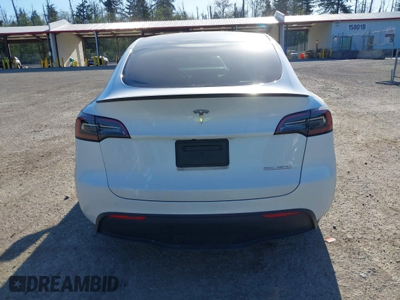 2023 Tesla Model Y Performance with VIN 7SAYGDEF2PF754938, listed as a IAAI auction lot 42067041 with 21,103 mi miles and . Bid and sale history available at DreamBid. Image 16.