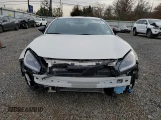 2023 Toyota GR86 with VIN JF1ZNBC17P8761781, listed as a Copart auction lot 80765984 with 8,717 mi miles and Salvage Title. Bid and sale history available at carsss.com. Image 5.