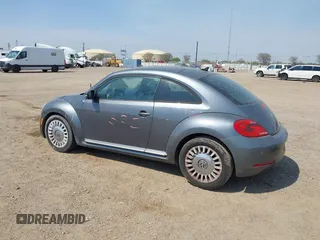 2014 Volkswagen Beetle 2.5L with VIN 3VWJX7AT7EM608634, listed as a IAAI auction lot 41783090 with 139,106 mi miles and . Bid and sale history available at DreamBid. Image 3.
