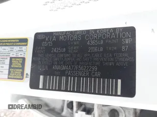 2015 Kia Optima LX with VIN KNAGM4A77F5622299, listed as a IAAI auction lot 42068196 with 200,908 mi miles. Bid and sale history available at carsss.com. Image 9.