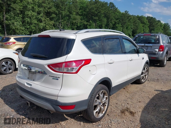 2015 Ford Escape Titanium with VIN 1FMCU9J90FUA05005, listed as a IAAI auction lot 42501764 with 121,993 mi miles and . Bid and sale history available at DreamBid. Image 4.