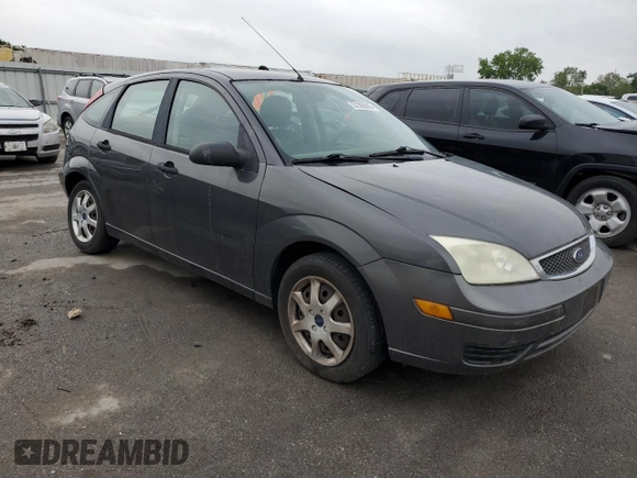 2005 Ford Focus S with VIN 3FAFP37N75R120187, listed as a Copart auction lot 57390605 with 163,547 mi miles and Salvage title. Bid and sale history available at DreamBid. Image 4.