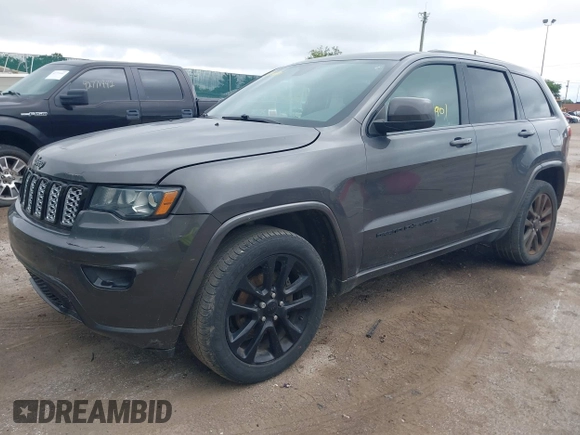 2018 Jeep Grand Cherokee Altitude z VIN 1C4RJFAGXJC190814, wystawiony jako IAAI lot #42660901 z przebiegiem 127 632 mil mil oraz . Historia ofert i sprzedaży dostępna na DreamBid. Obrazek 17.