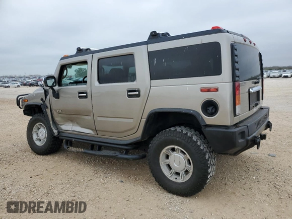 2003 Hummer H2 with VIN 5GRGN23U73H102412, listed as a Copart auction lot 87419024 with 176,456 mi miles and Salvage Title. Bid and sale history available at carsss.com. Image 2.