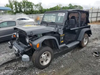 2002 Jeep Wrangler Sport z VIN 1J4FA49S12P730135, wystawiony jako Copart lot #54477835 z przebiegiem 148 153 mil mil oraz Szkoda całkowita • Salvage title. Historia ofert i sprzedaży dostępna na DreamBid. Obrazek 1.