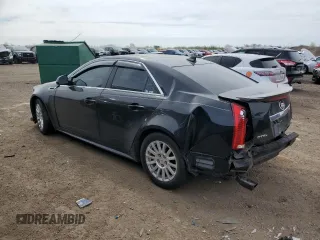 2011 Cadillac CTS Luxury z VIN 1G6DG5EY3B0161943, wystawiony jako Copart lot #54496845 z przebiegiem 148 305 mil mil oraz Szkoda całkowita • Salvage title. Historia ofert i sprzedaży dostępna na DreamBid. Obrazek 2.