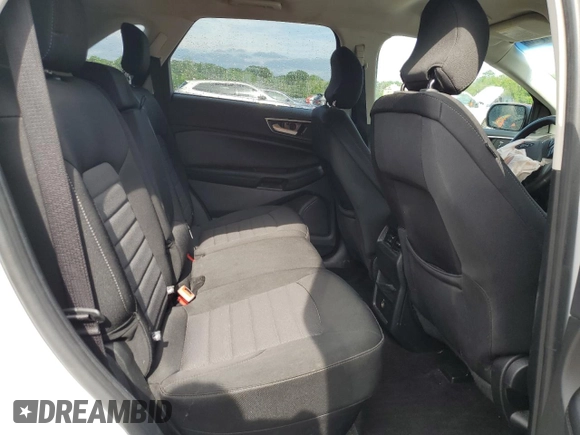 2019 Ford Edge SE z VIN 2FMPK4G94KBB24225, wystawiony jako Copart lot #61424715 z przebiegiem 73 324 mil mil oraz Szkoda całkowita • Salvage title. Historia ofert i sprzedaży dostępna na DreamBid. Obrazek 10.