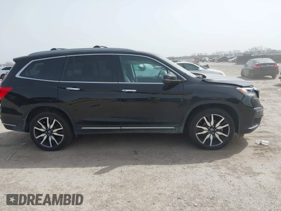 2020 Honda Pilot Touring 8-Passenger with VIN 5FNYF6H91LB003552, listed as a IAAI auction lot 41743685 with 76,725 mi miles and . Bid and sale history available at DreamBid. Image 13.