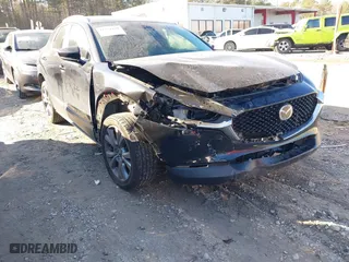 2023 Mazda CX-30 2.5 S Preferred Package with VIN 3MVDMBCM9PM519070, listed as a IAAI auction lot 41351129 with 76,711 mi miles. Bid and sale history available at carsss.com. Image 1.