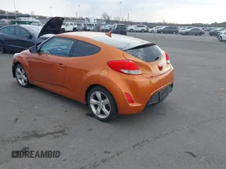 2013 Hyundai Veloster w/Black Int с VIN KMHTC6AD0DU122635, выставлен на аукционе IAAI как лот 41768900 с пробегом 110 358 миль миль и . История ставок и продаж доступна на DreamBid. Изображение 3.
